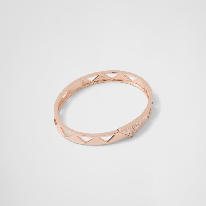 프라다 여성 팔찌 1JB420_2FPD_F0XEG Eternal Gold cut out bangle bracelet in pink이끌라프라다